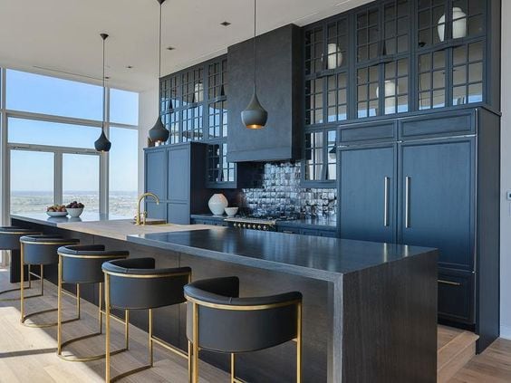 gray modern kitchen with island, bar stools